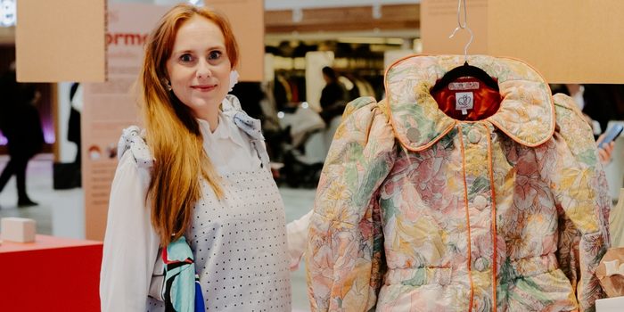 Lisa Setterberg shows one of qeenew's garments at Formex 2026: a jacket made from recycled bedspreads.  