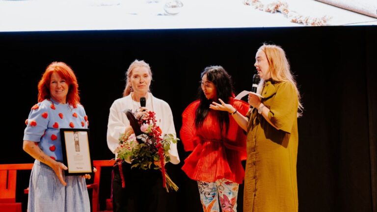 Malin Lindgren, Stickkan, and Anna Starrén, a designer, accept an award on the Formex stage.
